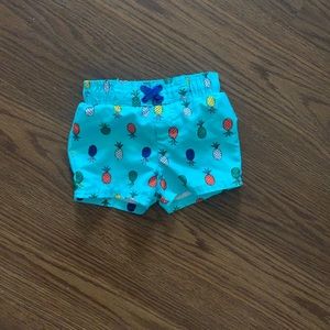 Baby boy pineapple swim trunks